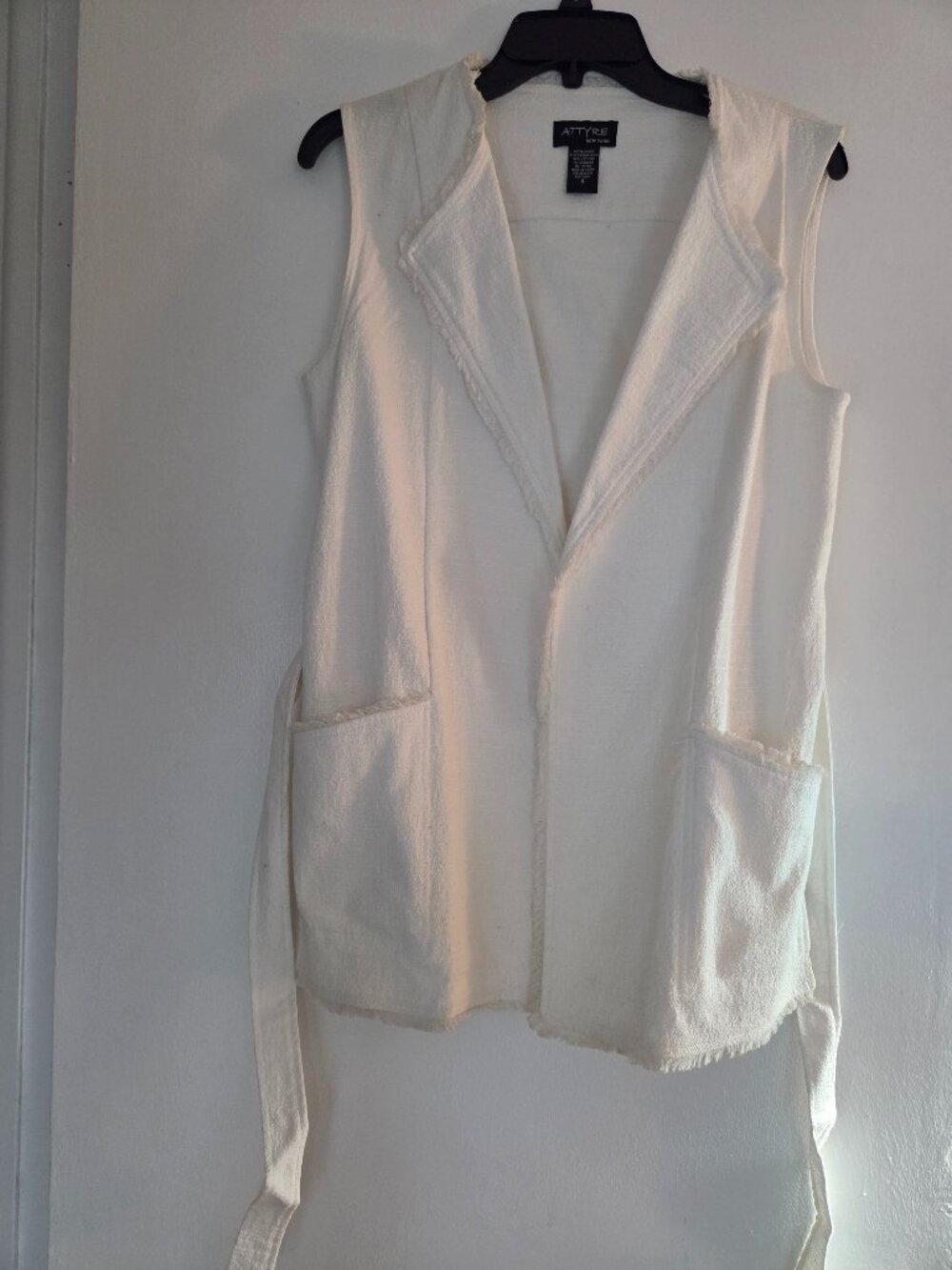 Two Linen style vests with belt and pockets.
